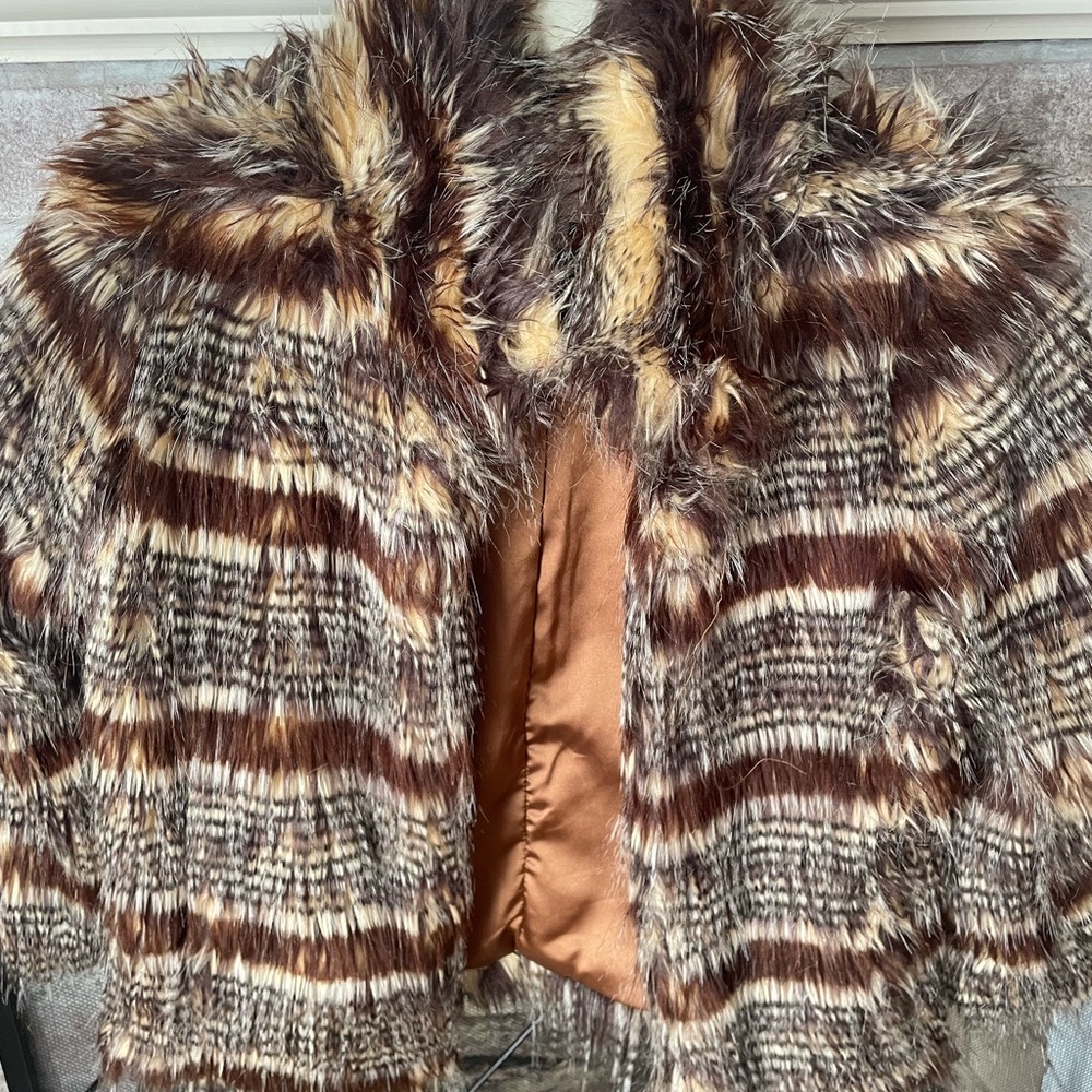 Faux fur coat size small, never worn, perfect condition